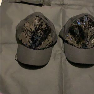 Red Saks fifth avenue black caps.